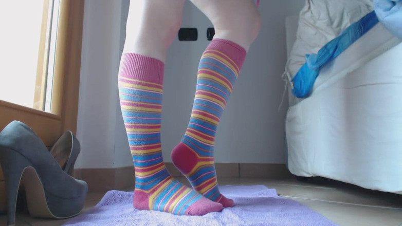 RavenBigAss: Young girl pissed on colorated socks