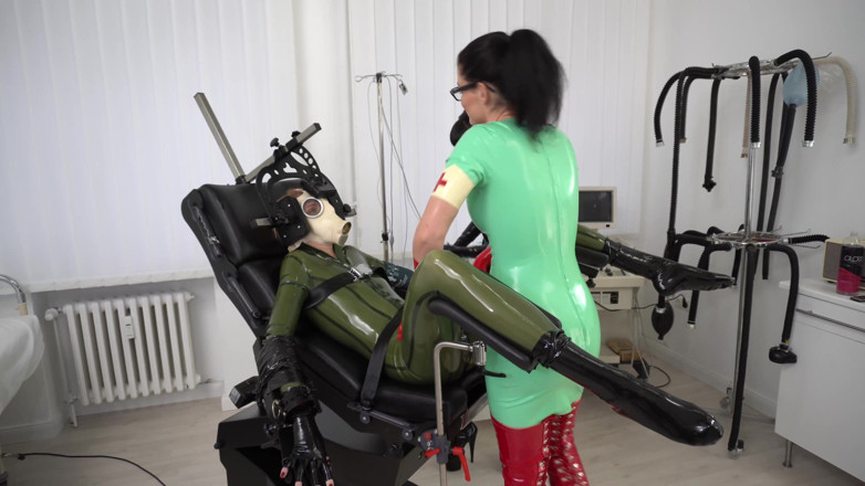 Rubber pervs: 2 Latex Femdoms Give the Slut a Medical Exam