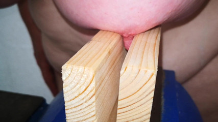 Bouncy Tits Action: Nipple squeezing in a vice