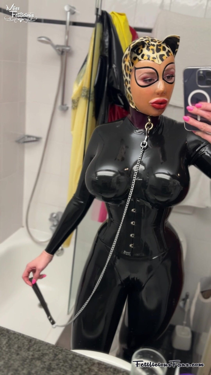 Miss_Fetilicious: Latex Leopard on a Leash