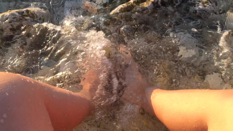Risky Hairy Couple: My Feet in the Sea Over the Stones