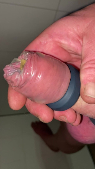 Foreskinguy: Uncut Cock with Tied Balls Pisses and Cums in Condom