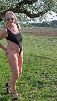 A Super-hot Granny in a Racy Thong Bodysuit!