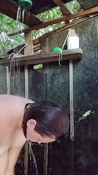 I'm Watching a Curvy Girl Wash Herself in the Street.