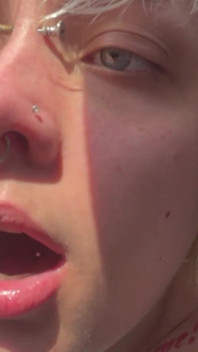 No Makeup Goth Girl in the Sun Flares Piggy Nose