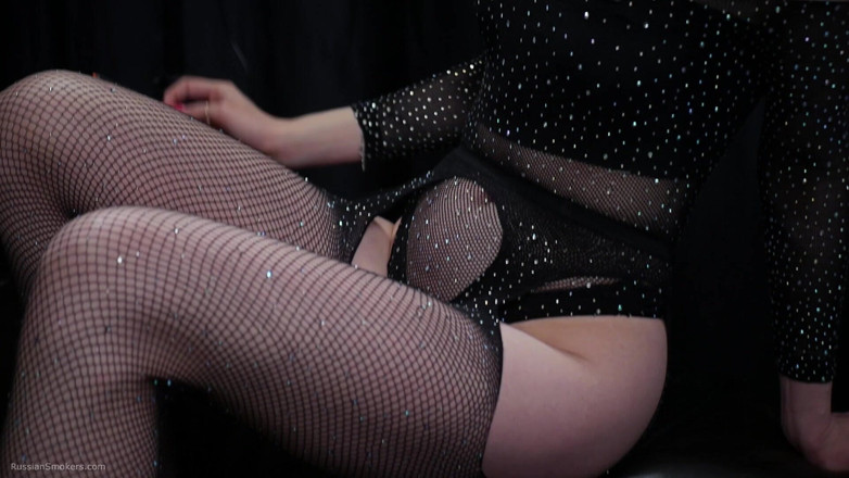 Russian Smokers: Sultry Brunette Smoking in Fishnets - Teasing Thong Reveal