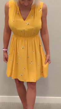 Stella in a Yellow Sun Dress with Black Heels