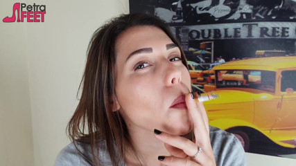 Smokin Fetish: Gorgeous brunette smokes a cigar in her bedroom