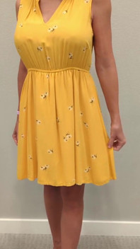 Stella in a Yellow Sun Dress with Black Heels