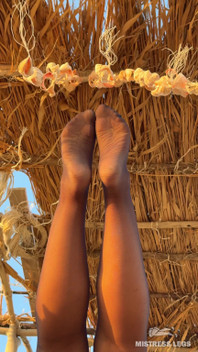 The Best View on the Beach Is Not the Sea, but My Feet in Black Tights Hanging Over Your Head
