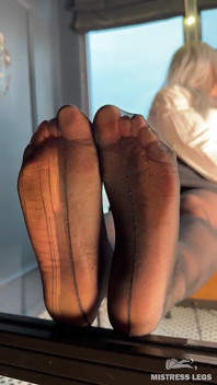 Watch Me Tease You with My Ripped Nylon Feet Through the Glass