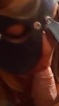 Blindfolded Brunette MILF Chained for Steamy Dungeon Play