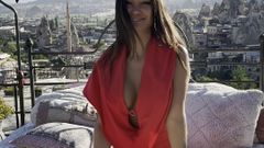 Monika Fox: Wunderschöne Monika Fox im roten Anzug in den Bergen von...