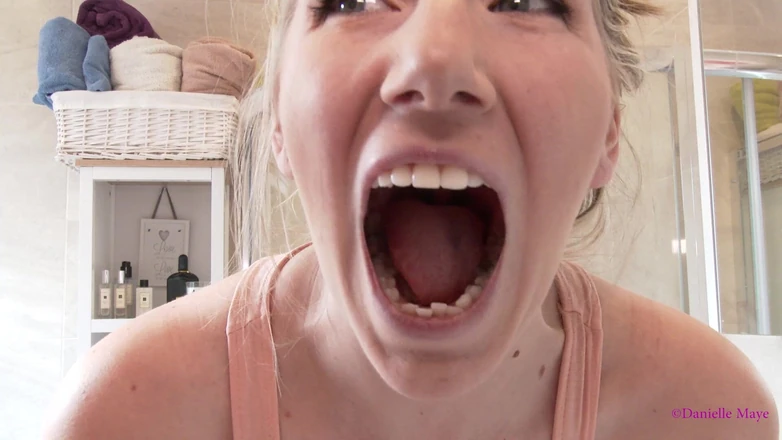 Danielle Maye: Pink Electric Toothbrush