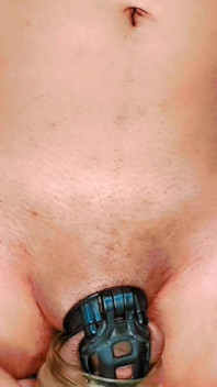 Standing Pissing in Chastity Cage
