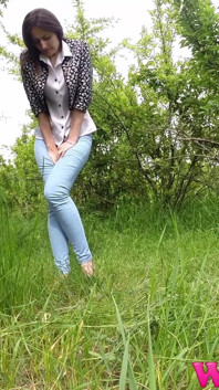 Desperate Skinny Girl in Jeans Trying to Hold Her Pee in the Forest