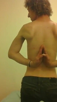 Topless Transgirl Surprised at Her Own Flexibility