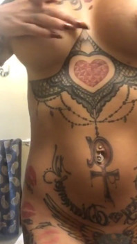 Busty Tattooed Babe