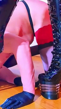 The Mistress Urinates Into the Cross-dressing Slave's Mouth