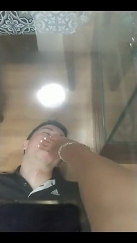 Foot Slave Under Tha Table