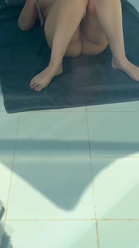 Stepmother Is Sunbathing and Reading a Book