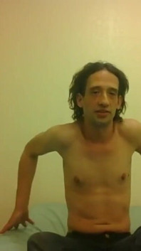Topless Transgirl Trying to Rotate Arms 360