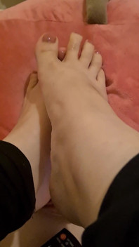 Freshly Painted and Oiled Toenails