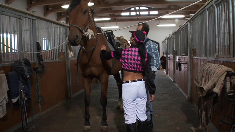 Worldwide Sex Movies: Jockey Girl Rides on Dick