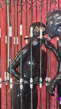Imprisoned Rubber Slut Has to Give a Blowjob