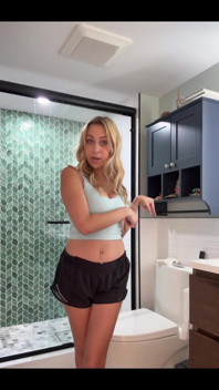 Squatting and peeing over the toilet