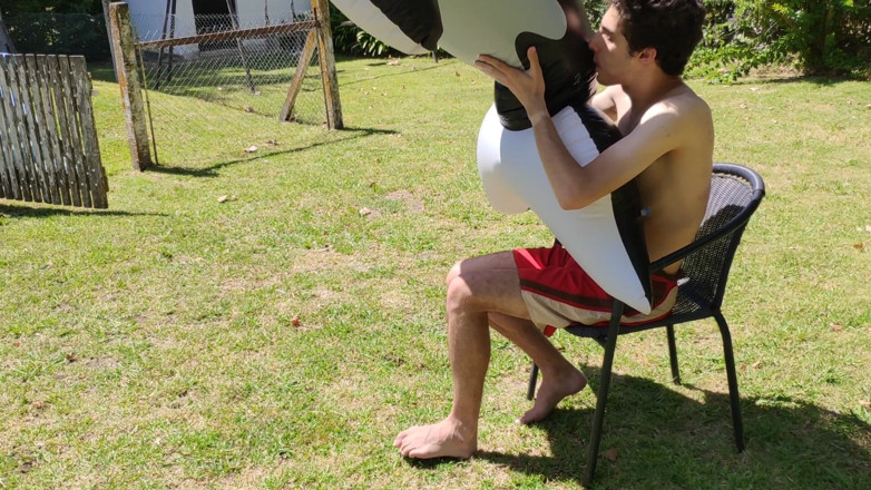 Floatie Boy: Beautiful Man Inflates His Inflatable Whale Near Pool Outside