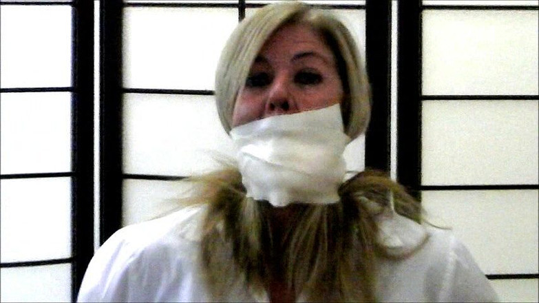 Selfgags classic: Bondage gear seller's gag demonstration!