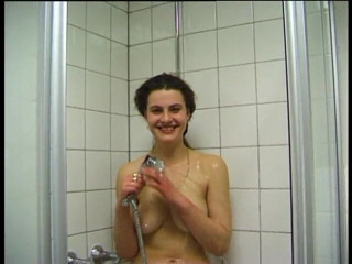 Lucky Cooch: Busty brunette is blowing hard dong in the bathroom