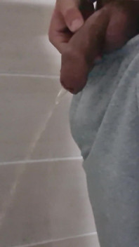 Guy Long Pissing with Uncircumcised Cock and Big Balls