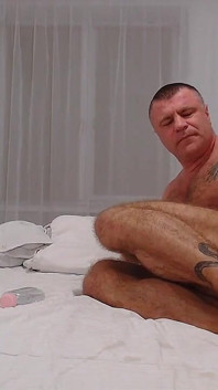 Hairy Muscular Hunk Doing Footjob with Oiled Feet