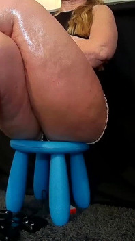 Sexy and Leggy on the Low Chair 1