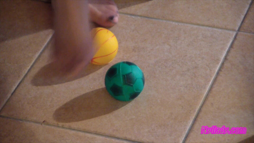 Nyllady Squeezes Rubber Balls Massaging Her Hosed Feet (Nyllady) Nyllady Squeezes Rubber Balls Massaging Her Hosed Feet (Nyllady)