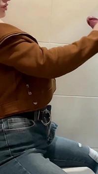Busty Blonde Sucks Cock in the School Bathroom