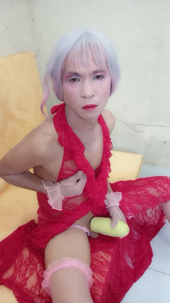 Transgender Le Wearing a Sexy Dress Erotic Masturbating with a Fake Can thumbnail