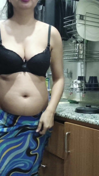 Indian Stepmom Watches and Enters Her Stepson's Kitchen to Fuck Him.