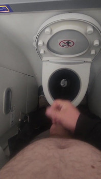 Airplane Bathroom Jerk and Cum.