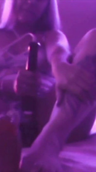 Young Girl Using Her Feet to Play with the Dildo While Masturbating