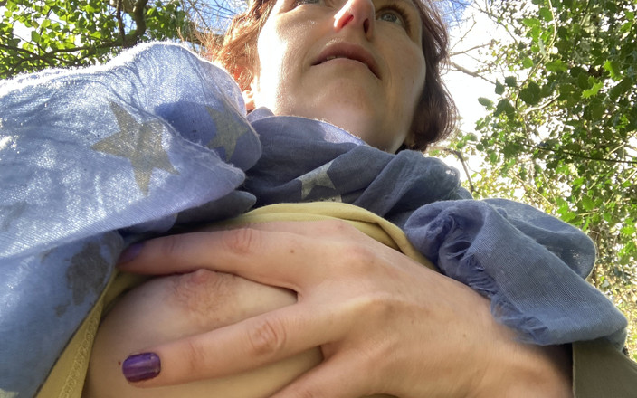 MistressWriggler: Playing with my beautiful boobs as I walk along the...