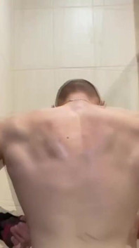 Alpha Shows off His Back Muscles