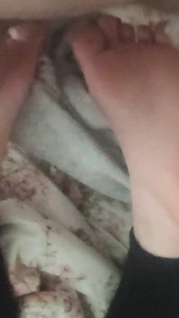 Playing with Friends Soles, While She's Reading.