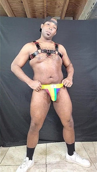 Big Dicked Stud Jerking Huge Cock in Rainbow Print Jock