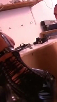 Mature Brunette Stretched Wide by Gloved Fist in Garage