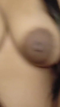 Hot Young Girl. Under the Sheets, She Wets Her Panties with Orgasm.