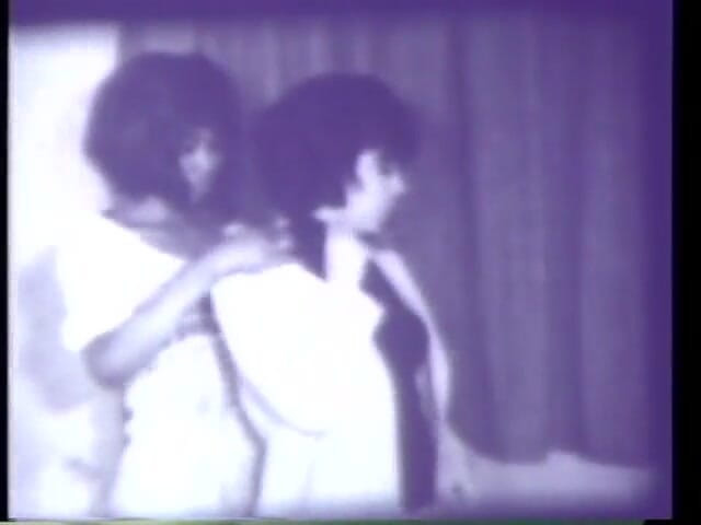 Vintage Usa: Vintage 3some with horny black & white milf and strapon dildo (No audio...