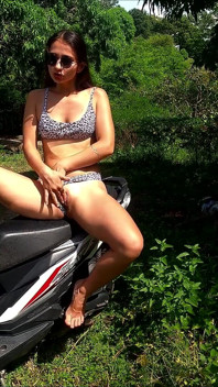 Tourist Girl Makes Show on Bike